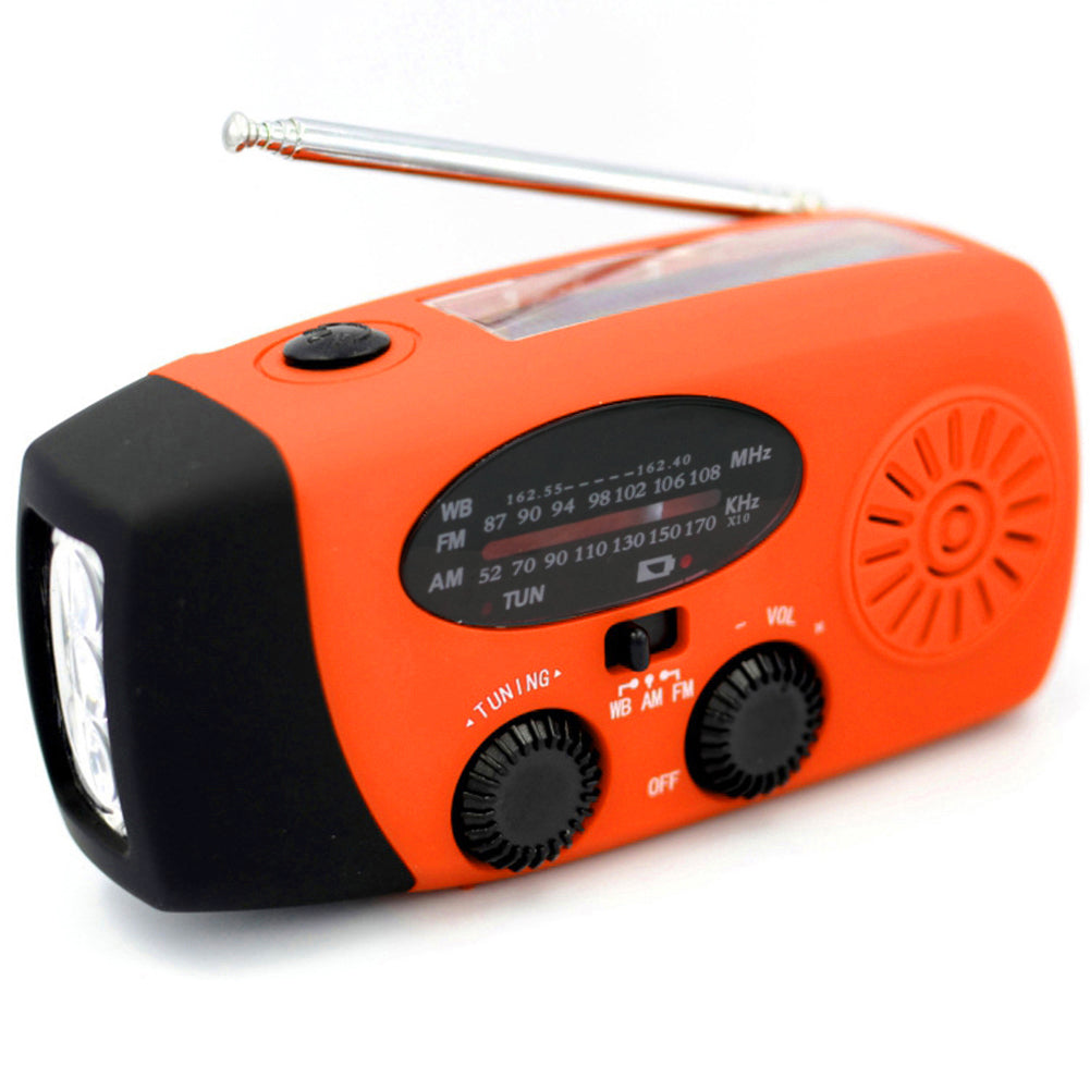 Solar energy hand-held emergency radio flashlight